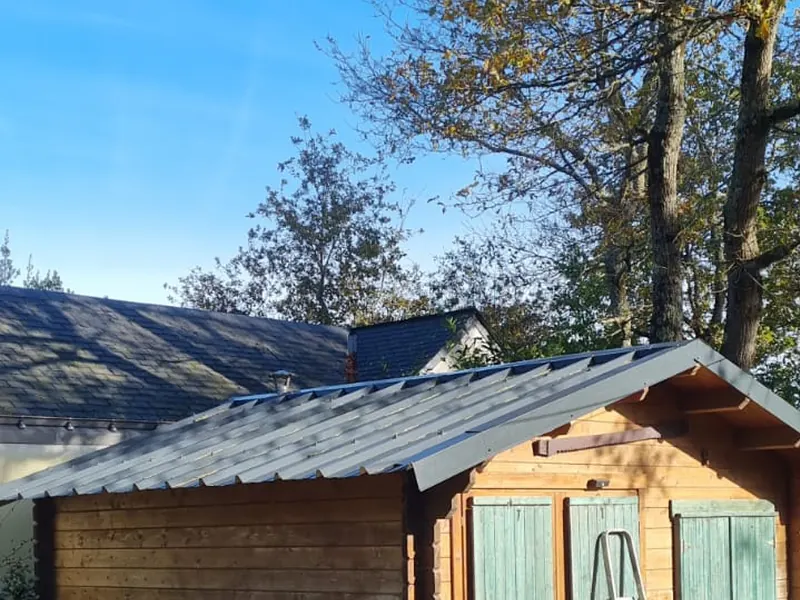 Couverture bac acier neuve sur chalet bois