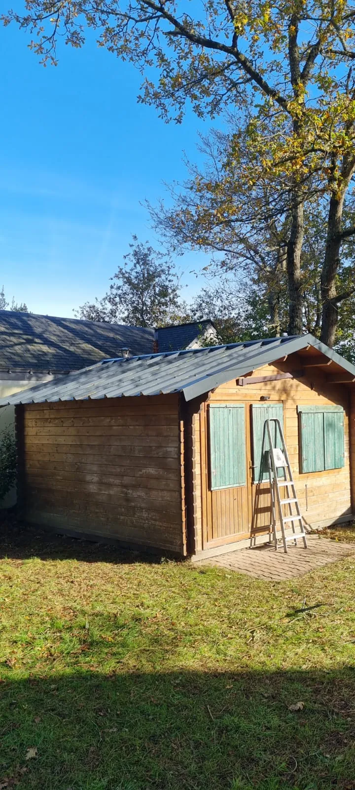 Couverture bac acier neuve sur chalet bois